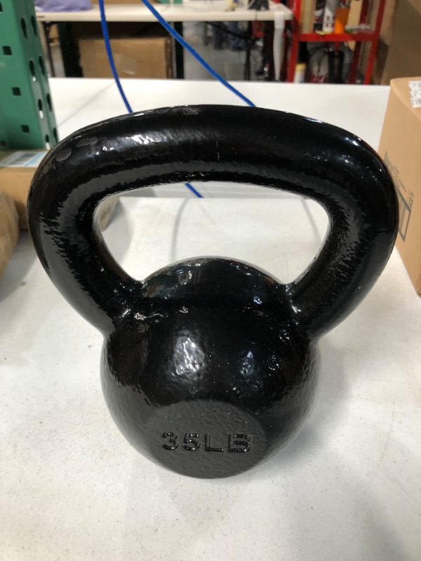 Photo 1 of Amazon Basics Enamel Cast Iron Kettlebell - 35 Pounds, Black & Cast Iron Kettlebell - Black