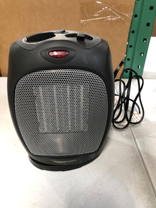 Photo 3 of -USED-Amazon Basics 1500W Oscillating Ceramic Heater with Adjustable Thermostat, Black Black Heater with Oscillating