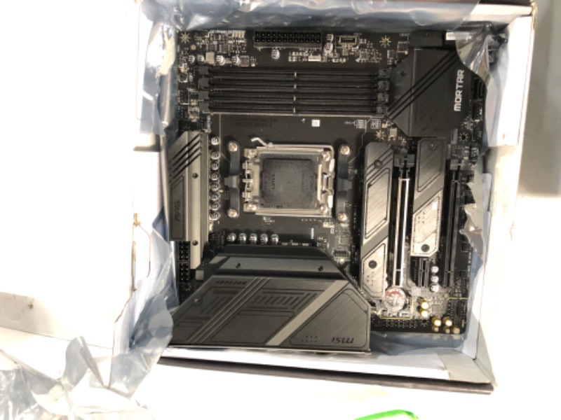 Photo 3 of MSI MAG B650M Mortar WiFi Gaming Motherboard (AMD AM5, mATX, DDR5, PCIe 4.0, M.2, SATA 6Gb/s, USB 3.2 Gen 2, HDMI/DP, Wi-Fi 6E, AMD Ryzen 7000 Series Desktop Processors)