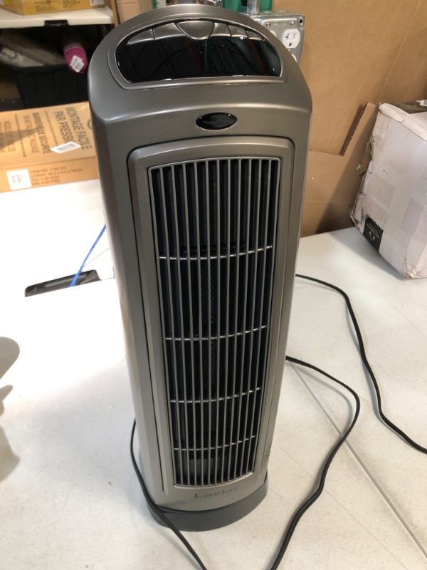 Photo 1 of Lasko 1500W Digital Ceramic Space Heater with Remote, 755320, Silver 7.25"D x 8.6"W x 23"H