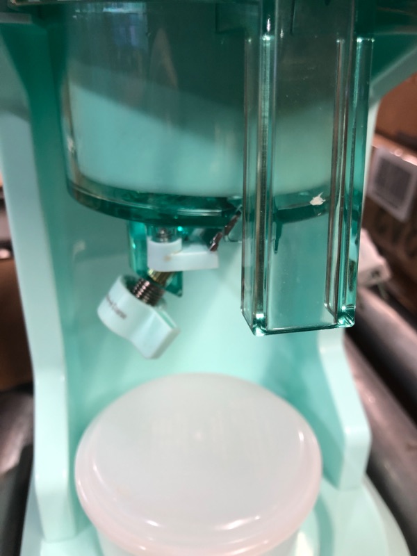 Photo 4 of Nostalgia Retro Electric Table-Top Snow Cone Maker, Vintage Shaved Ice Machine Includes 2 Molds, Aqua Classic Ice Shaver