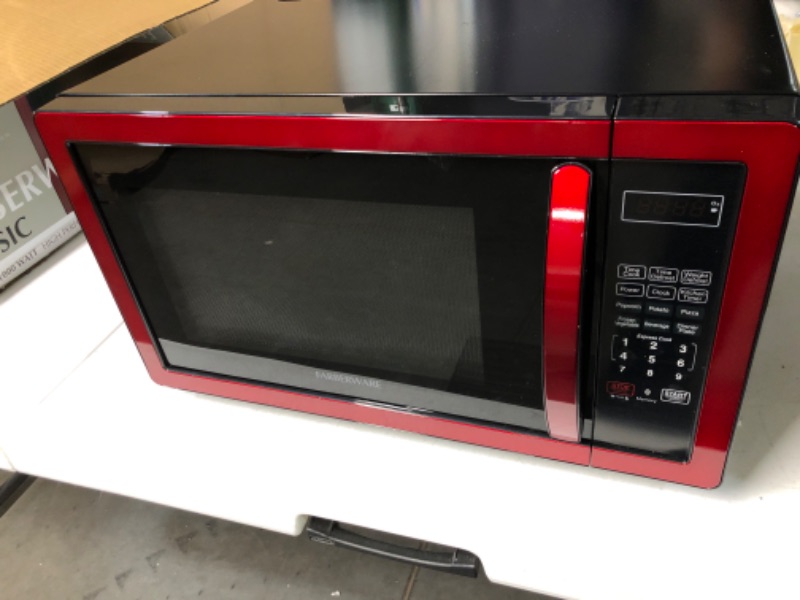 Photo 3 of **SEE NOTES**
Farberware Classic FMO11AHTBKN 1.1 Cu. Ft. 1000-Watt Microwave Oven with LED Lighting, Metallic Red