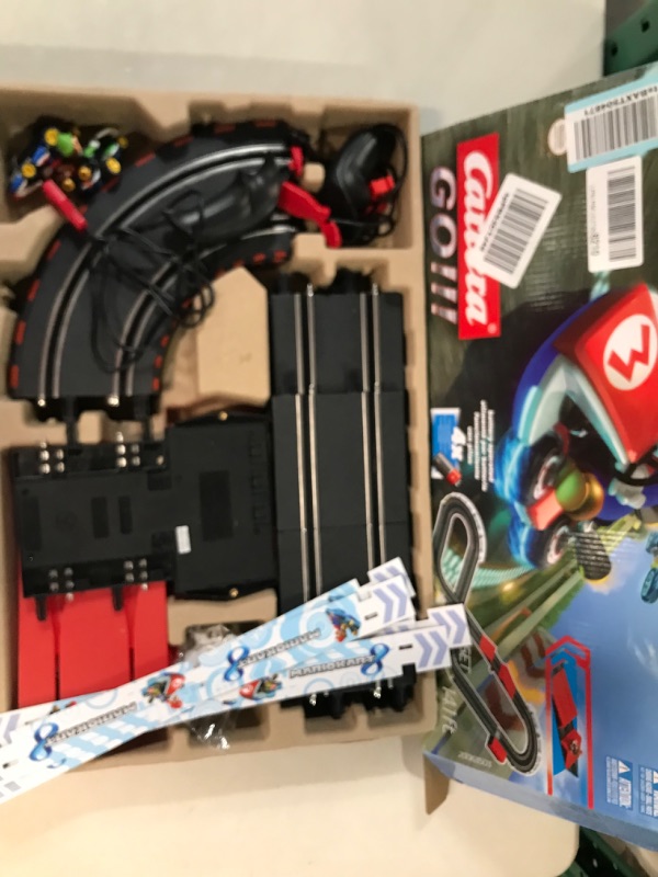 Photo 2 of Carrera GO!!!  Mario Kart Battery Operated 1:43 Scale Slot Car Racing Toy Track Set 