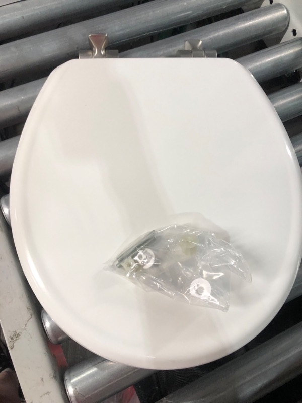Photo 2 of Mansfield Round Closed Front White Plastic Standard Toilet Seat - 1 Each