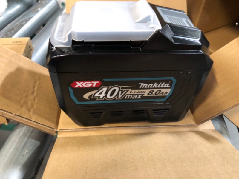 Photo 3 of Makita 40V Max XGT 8.0Ah Lithium-Ion Digital Communication Battery with Impact-Resistant Outer Case, Shock-Absorbing Inner Liner, and Four Bright Green LED Indicators