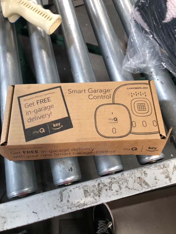 Photo 1 of myQ Chamberlain Smart Garage Control - Wireless Garage Hub and Sensor with Wifi & Bluetooth - Smartphone Controlled, myQ-G0401-ES, White myQ Smart Garage™ Control