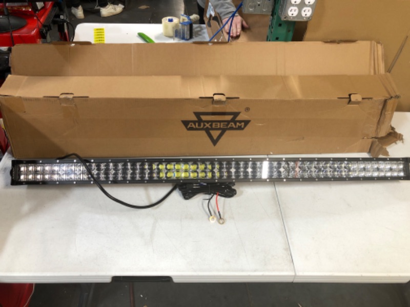 Photo 2 of Auxbeam 50 Inch LED Light Bar 288W LED Driving Light 52.36 x 5.51 x 8.66 inches