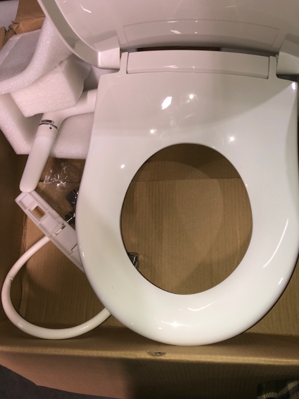 Photo 3 of -USED-Kohler 76923-0 Puretide Toliet Seat, Round Manual Non Electric Bidet with Adjusting Spray Pressure and Position, Quiet-Close Lid, White White Round Toilet Seat