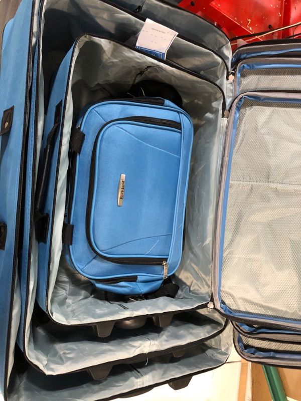 Photo 1 of -USED-Rockland Journey Softside Upright Luggage Set, Blue, 4-Piece (14/19/24/28) 4-Piece Set, Blue