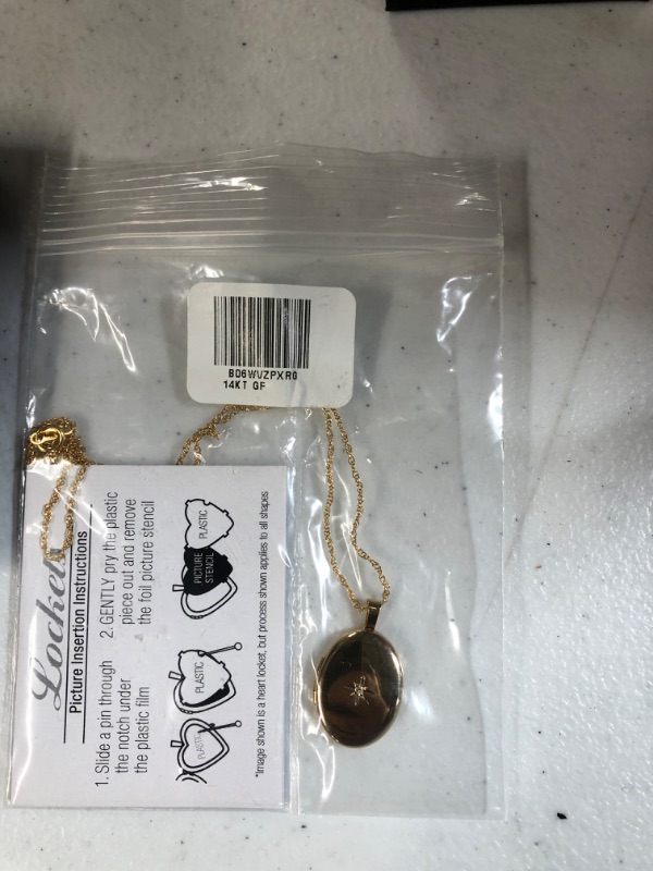 Photo 2 of Amazon Collection 14k Gold-Filled Polished Oval Pendant with Genuine Diamond Locket Necklace, 18"