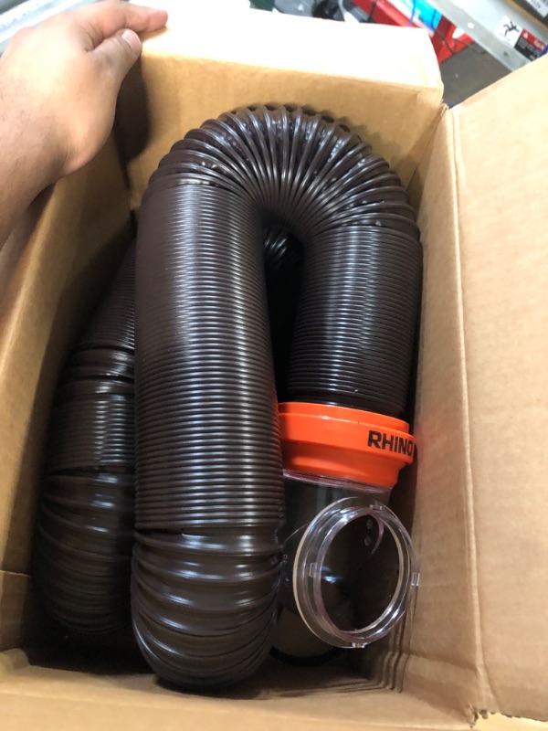 Photo 2 of Camco RhinoFLEX RV Sewer Hose Kit with Swivel Transparent Elbow and 4-in-1 Dump Station Fitting, Brown, 15 Feet (39770) 15ft Sewer Hose Kit Frustration-Free Packaging