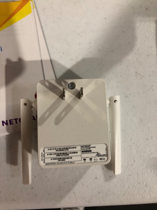 Photo 4 of NETGEAR Wi-Fi Range Extender EX2700 - Coverage Up to 800 Sq Ft and 10 devices with N300 Wireless Signal Booster & Repeater (Up to 300Mbps Speed), and Compact Wall Plug Design WiFi Extender N300