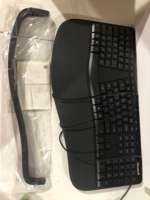 Photo 2 of *** USED ** Microsoft Ergonomic Keyboard - Black. Wired, Comfortable, Ergonomic Keyboard with Cushioned Wrist and Palm Support. Split Keyboard. Dedicated Office Key.