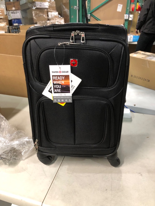 Photo 4 of **BRAND NEW** SwissGear Sion Softside Expandable Roller Luggage, Black, Carry-On 21-Inch Carry-On 21-Inch Black