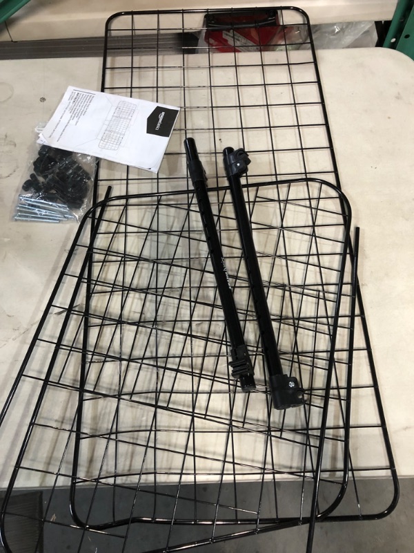 Photo 1 of Amazon Basics Adjustable Dog Car Barrier 16-inch Black