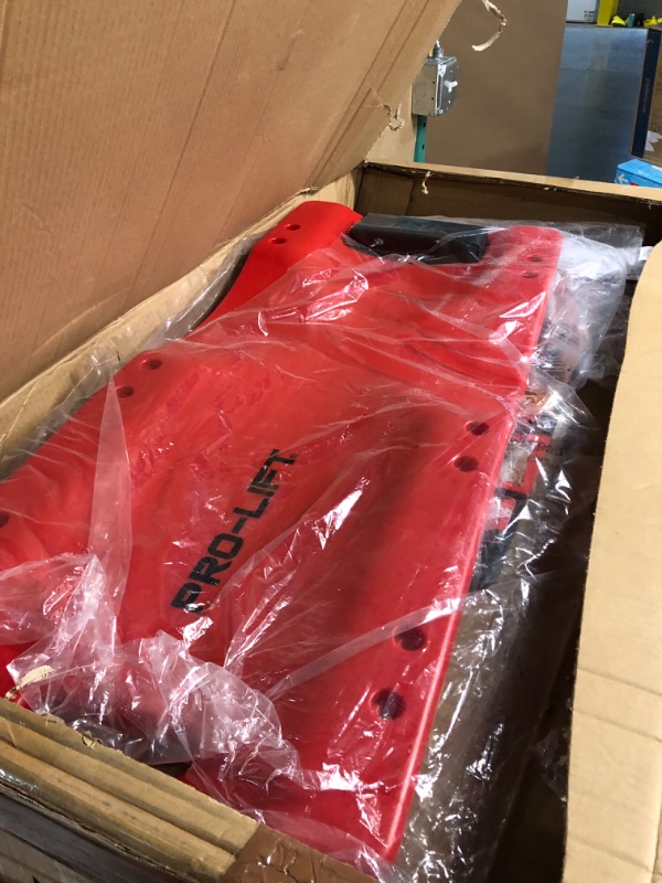 Photo 1 of Omega Lift Mechanic Plastic Creeper 48 Inch- red