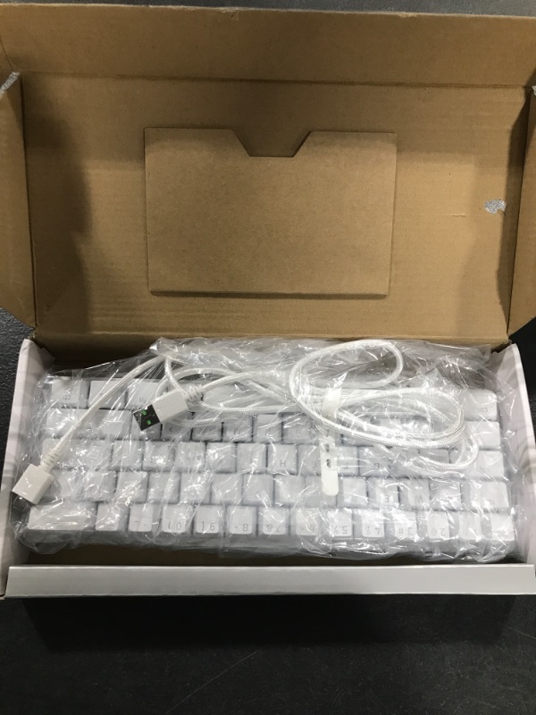 Photo 2 of Razer Huntsman Mini 60% Gaming Keyboard: Fast Keyboard Switches - Linear Optical Switches - Chroma RGB Lighting - PBT Keycaps - Onboard Memory - Mercury White
