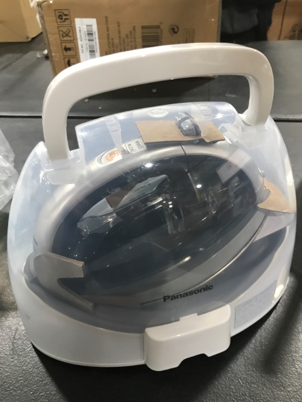 Photo 2 of Panasonic NI-WL600 Cordless, Portable 1500W Contoured Multi-Directional Steam/Dry Iron, Stainless Steel Soleplate, Power Base and Carrying/Storage Case, Silver Curved Cordless Iron