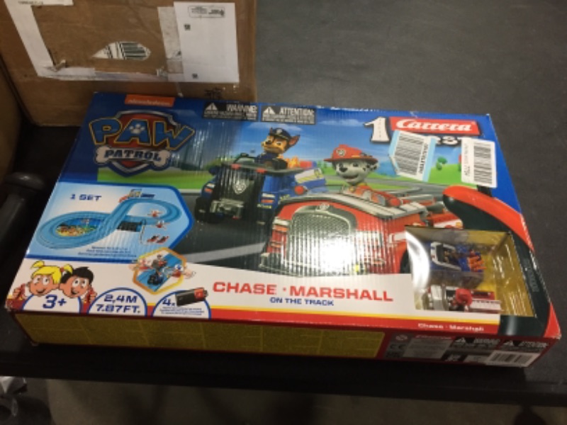 Photo 2 of Carrera First Paw Patrol - Slot Car Race Track - Includes 2 Cars: Chase and Marshall - Battery-Powered Beginner Racing Set for Kids Ages 3 Years and Up, Multi