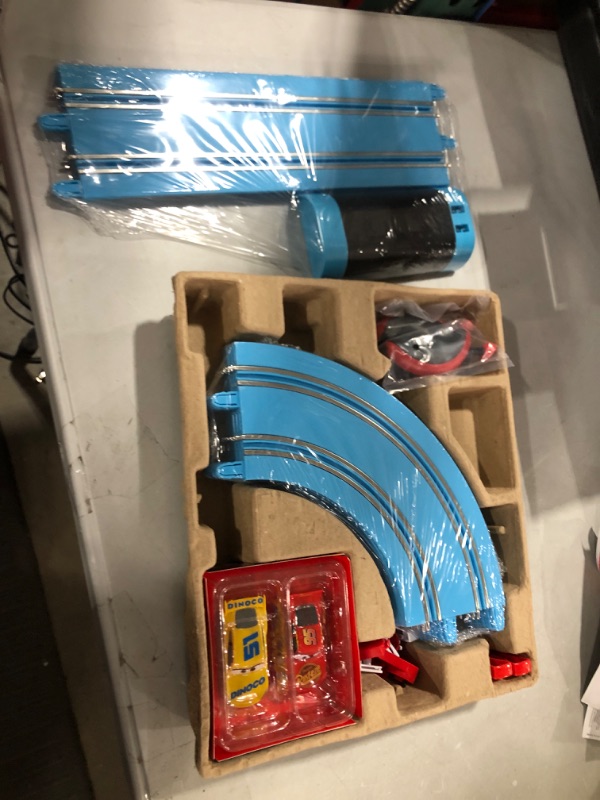 Photo 2 of Carrera First Disney/Pixar Cars - Slot Car Race Track - Includes 2 Cars: Lightning McQueen and Dinoco Cruz - Battery-Powered Beginner Racing Set for Kids Ages 3 Years and Up Disney Cars w/ Spinners