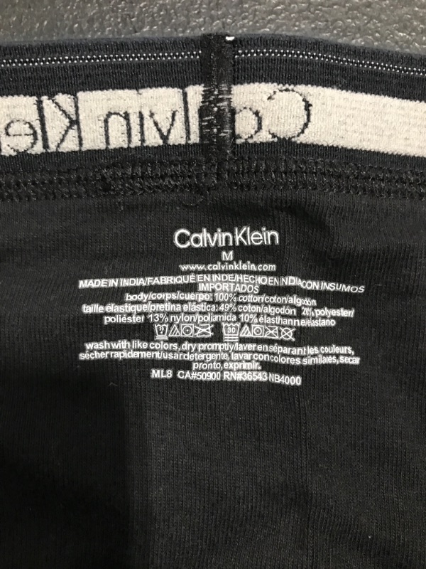 Photo 2 of 4 PACK MEN'S CALVIN KLEIN UNDERWEAR. BLACK, SIZE MEDIUM. OPEN PACKAGE. 