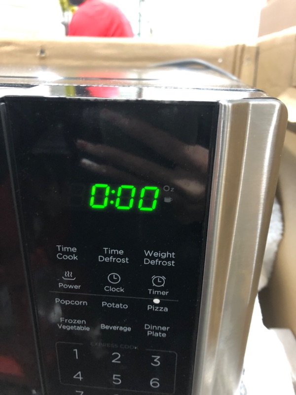 Photo 3 of (USED) Farberware Countertop Microwave 1.1 Cu. Ft. 1000-Watt Compact Microwave Oven with LED lighting, Child lock, and Easy Clean Interior, Stainless Steel Interior & Exterior***********USED AND DIRTY*************