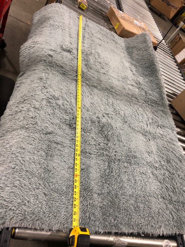 Photo 1 of 72" X 48" AREA RUG- GRAY FUZZY