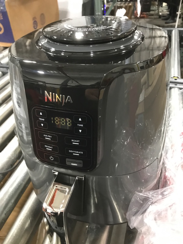 Photo 4 of Ninja AF101 Air Fryer that Crisps, Roasts, Reheats, & Dehydrates, for Quick, Easy Meals, 4 Quart Capacity, & High Gloss Finish, Black/Grey 4 Quarts