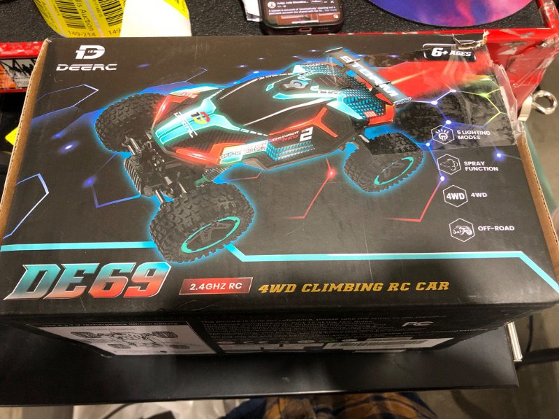 Photo 1 of DEERC DE69 Remote Control Truck with Spray and Light, 5 LED Light Modes, Dual Motors Off Road RC Car, 4WD Rock Crawler, Spray Water Mist, 35+ Min Play, Toy Vehicle for Boys Girls and Adults