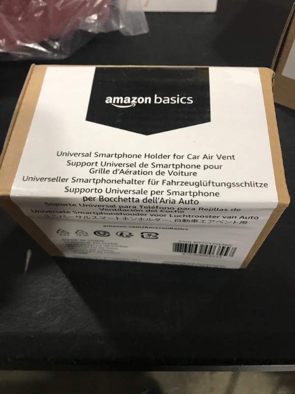 Photo 2 of Amazon Basics Universal Smartphone Holder for Car Dashboard