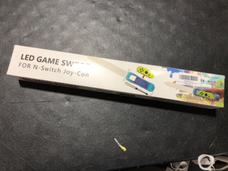 Photo 1 of ECHZOVE LED Game Sword for Nintendo Switch Joy-Con, Hand Grip for Skyward Sword Switch Game Compatible with Nintendo Switch Sports with Hand Strap - 1 Pack Blue