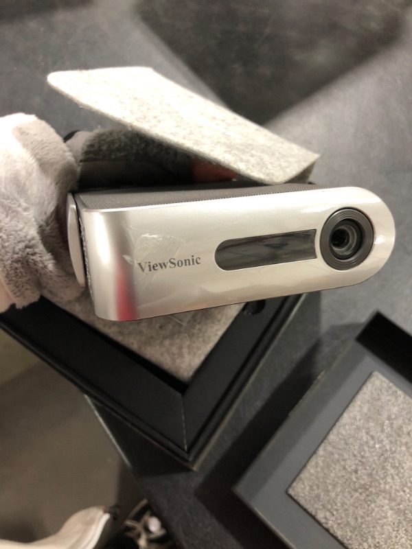 Photo 1 of ViewSonic M1 Portable LED Projector with Auto Keystone, Dual Harman Kardon Speakers, HDMI, USB C, Stream Netflix with Dongle Portable Portable Projector