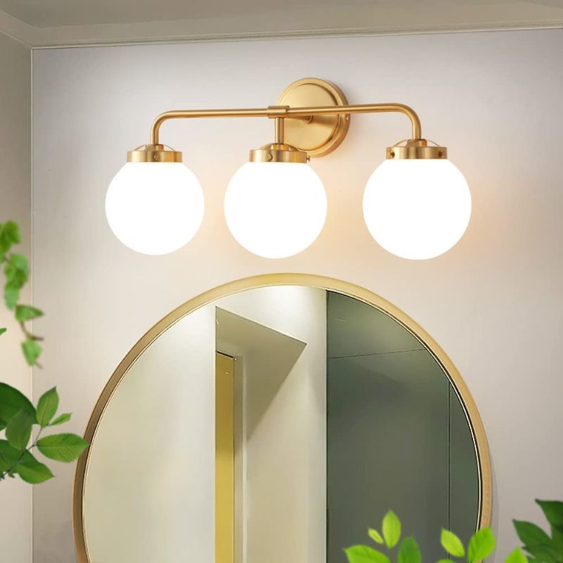 Photo 1 of  Deyidn Gold Bathroom Vanity Light Fixtures Over Mirror, Modern Brass 3 Lights Wall Sconce with Milky Glass Ball Shade, Mid Century Farmhouse Vanity Lighting--MINOR BOX DAMAGE 