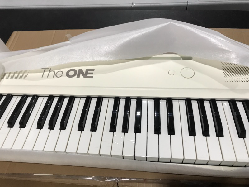 Photo 2 of The ONE Smart Keyboard COLOR 61 Lighted Keys Keyboard Piano, MIDI Electronic Piano for Beginners with 256 Tones, 64 Polyphony, Built-in LED Lights and Free Apps (White)