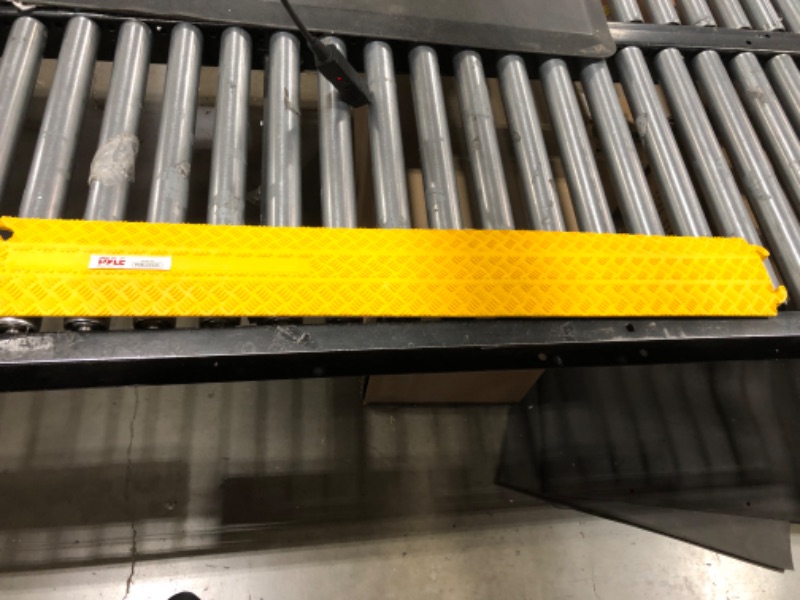 Photo 2 of Durable Cable Protection Ramp Cover Supports 11000lbs Single Channel Heavy Duty Hose & Cord Track Floor Protection,39.4”x5.11”x0.78” Cable Concealer for Indoor Outdoor Use-Pyle PCBLCO101 Yellow/Single