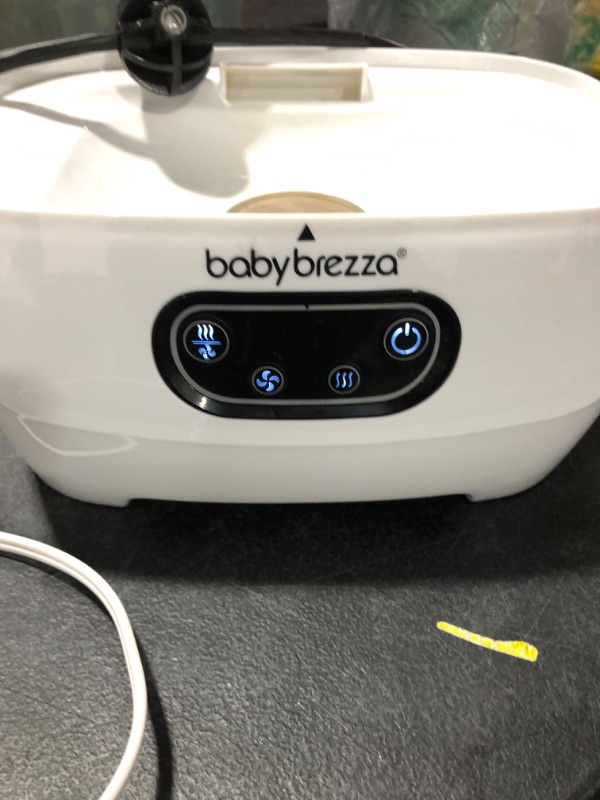 Photo 3 of Baby Brezza Baby Bottle Sterilizer and Dryer Advanced – Electric Steam Sterilization Machine – Universal Sterilizing for All Bottles: Plastic + Glass + Pacifiers + Breast Pump Parts - HEPA Filtration
