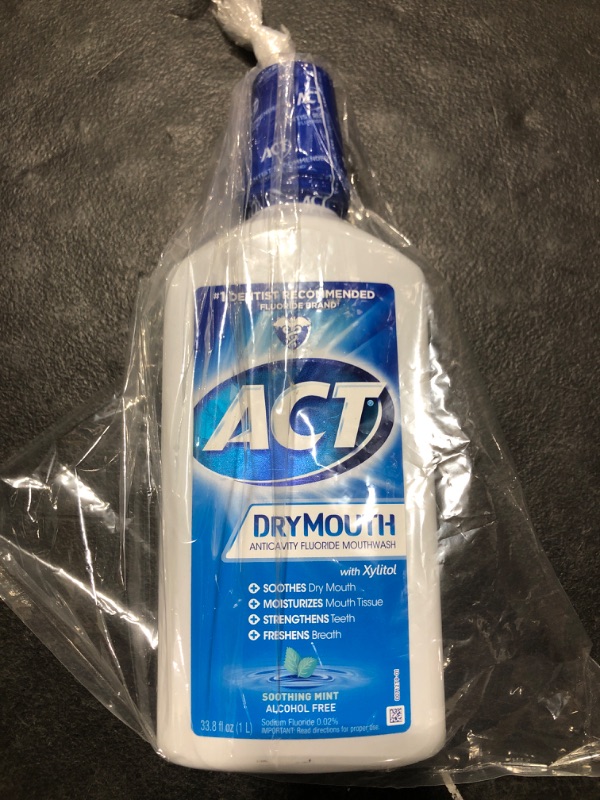 Photo 2 of ACT Dry Mouth Anticavity Zero Alcohol Fluoride Mouthwash, Soothing Mint, 33.8 fl. oz. 33.8 Fl Oz (Pack of 1)