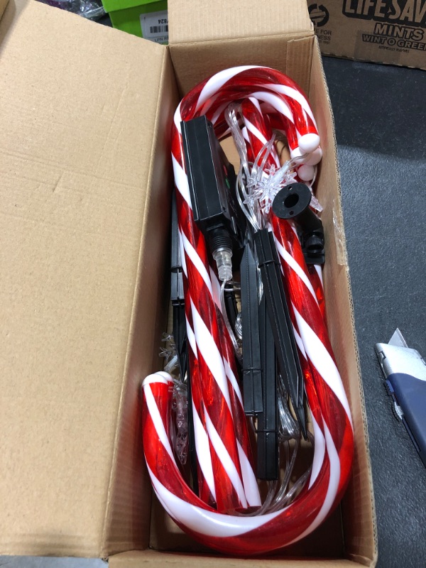 Photo 2 of Christmas Candy Cane Solar Lights with SnowflakesCandy Cane Lights Set of 8,Red and White Yard Lights for Holiday Xmas Indoor Courtyard Patio Garden Walkway