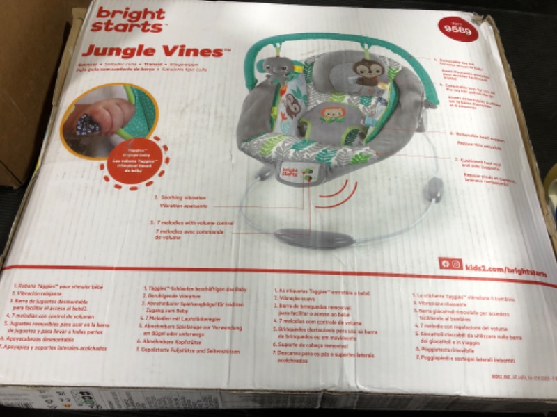 Photo 1 of Bright Starts Jungle Vines Comfy Baby Bouncer and Vibrating Infant Seat with Taggies & Elephant and Sloth Plush Baby Toys