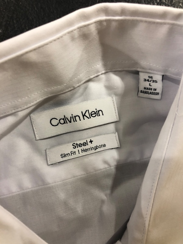 Photo 3 of Calvin Klein Steel Men's Slim-Fit Non-Iron Performance Spread Collar Herringbone Dress Shirt
