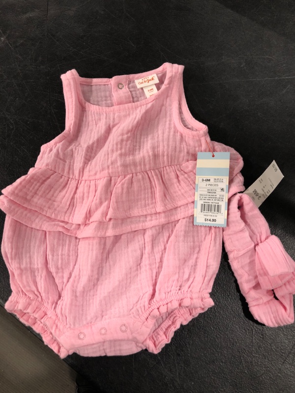 Photo 2 of Baby Girls' Gauze Romper with Headband - Cat & Jack™
SIZE 3-6 MONTHS