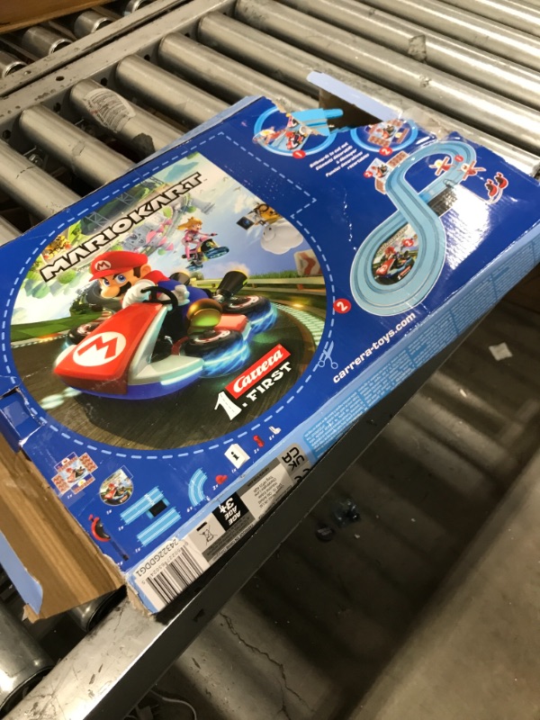 Photo 2 of Carrera First Mario Kart - Slot Car Race Track with Spinners - Includes 2 Cars: Mario and Peach - Battery-Powered Beginner Racing Set for Kids Ages 3 Years and Up Mario Kart w/ Peach