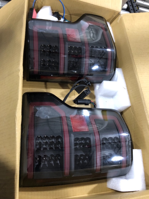 Photo 2 of Anzo USA 321338 Tail Light Assembly LED Clear Lens Black Housing Red/White Light Color Pair Tail Light Assembly