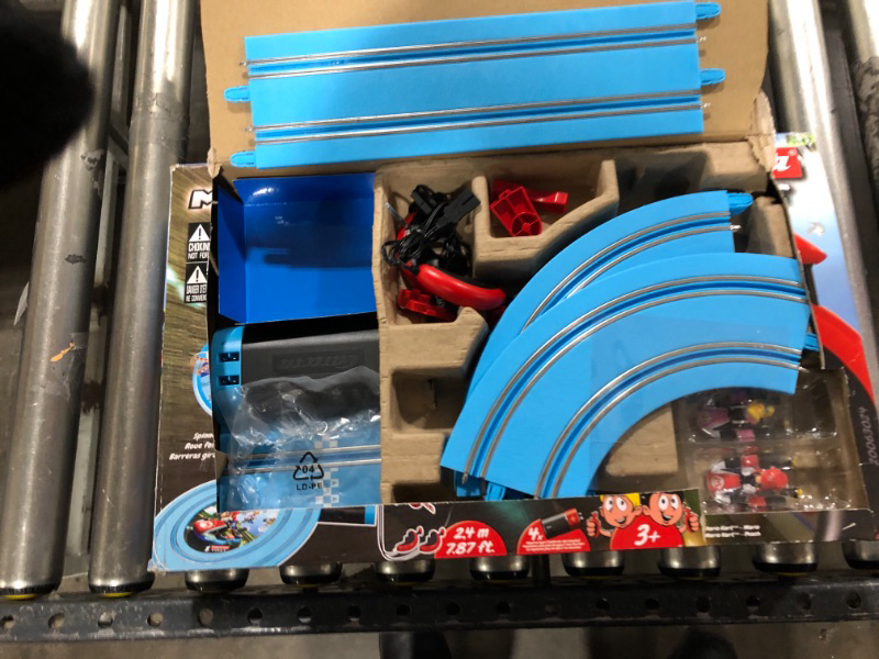 Photo 2 of Carrera First Mario Kart - Slot Car Race Track with Spinners - Includes 2 Cars: Mario and Peach - Battery-Powered Beginner Racing Set for Kids Ages 3 Years and Up Mario Kart w/ Peach