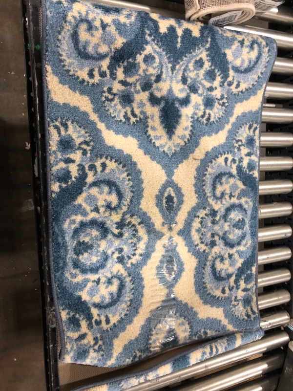 Photo 1 of 24x65 blue and white runner