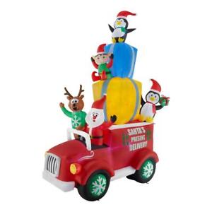 Photo 1 of 12 ft Santa's Present Delivery Truck with Swirling Lights Christmas Inflatable