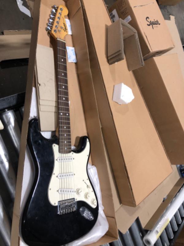 Photo 4 of Squier by Fender Stratocaster Beginner Guitar Pack, Laurel Fingerboard, Black, with Gig Bag, Amp, Strap, Cable, Picks, and Online Lessons Black Short Scale