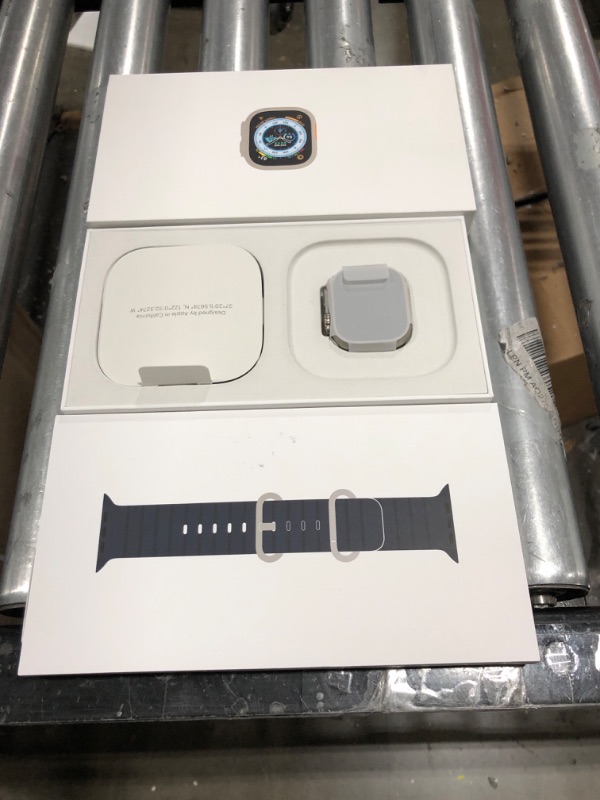 Photo 2 of Apple Watch Ultra 49mm Titanium Case with Midnight Ocean Band
