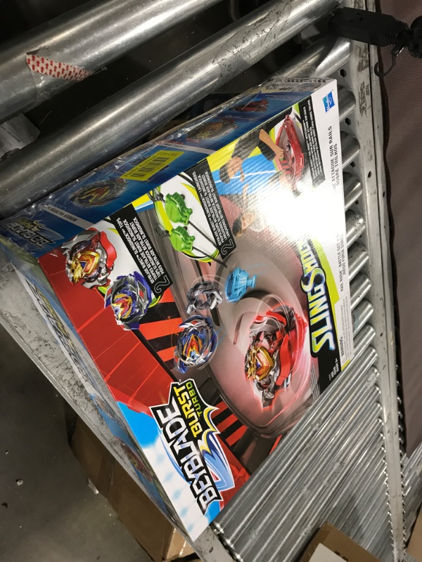 Photo 3 of BEYBLADE Burst Turbo Slingshock Rail Rush Battle Set -- Complete Set Burst Beystadium, Battling Tops, and Launchers (Amazon Exclusive)