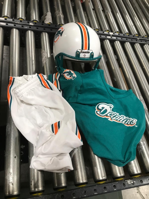 Photo 2 of Miami Dolphins Youth NFL Deluxe Helmet and Uniform Set - Med *Stains; Helmet has minor scratches